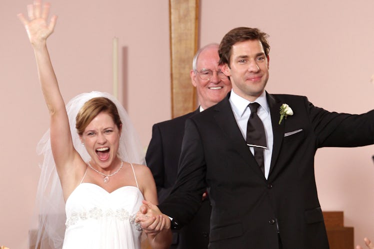 Pam (Jenna Fischer) and Jim (John Krasinkski) celebrate their wedding on The Office