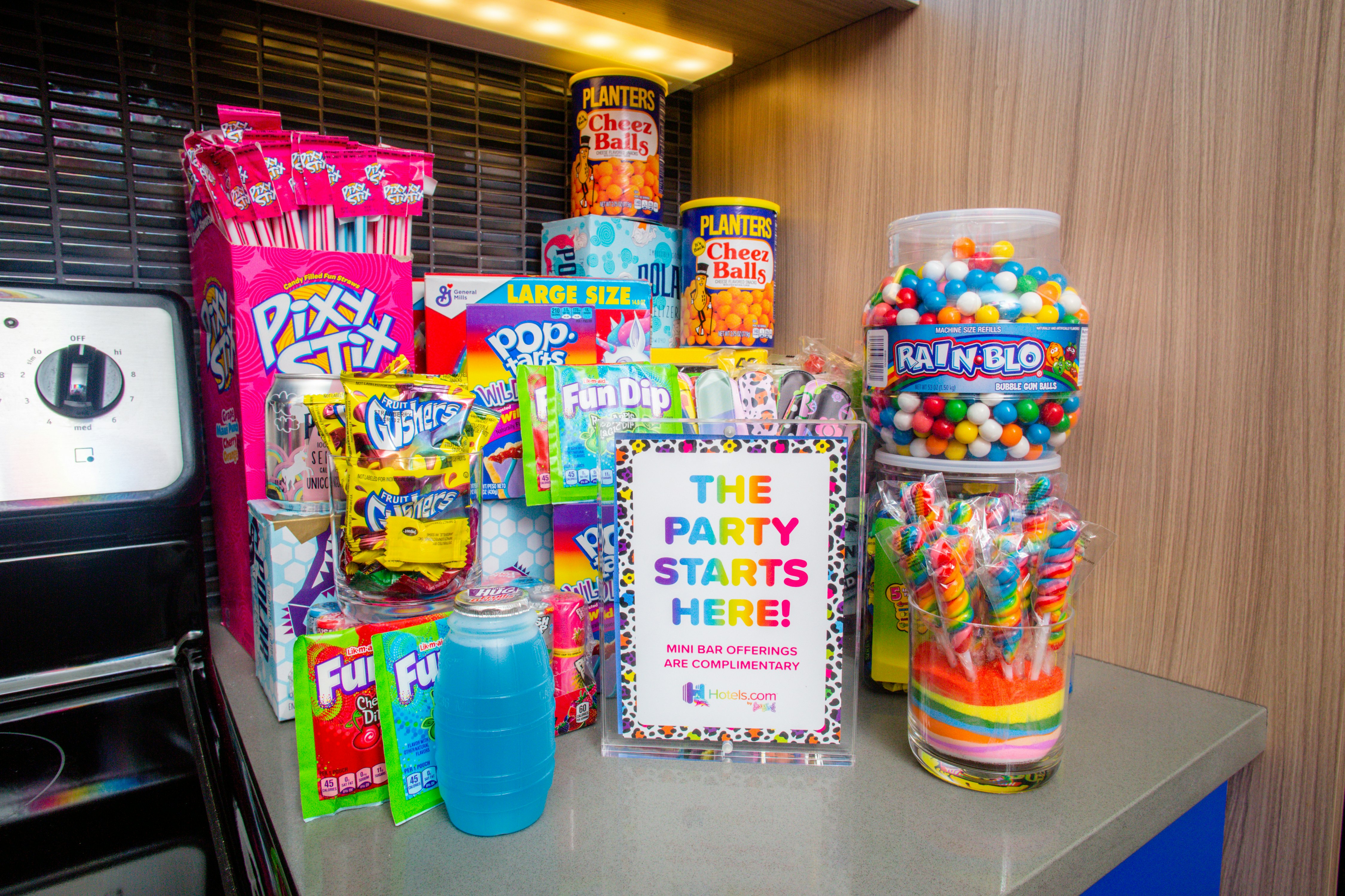 This Lisa Frank Themed Hotel Room Is A Rainbow Dream