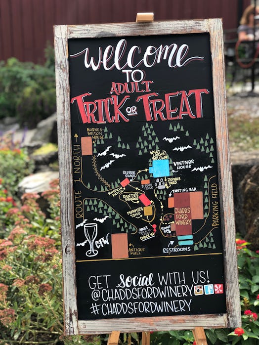 A chalkboard sign at Chaddsford Winery tells guests where to stop for wine and treats during their A...