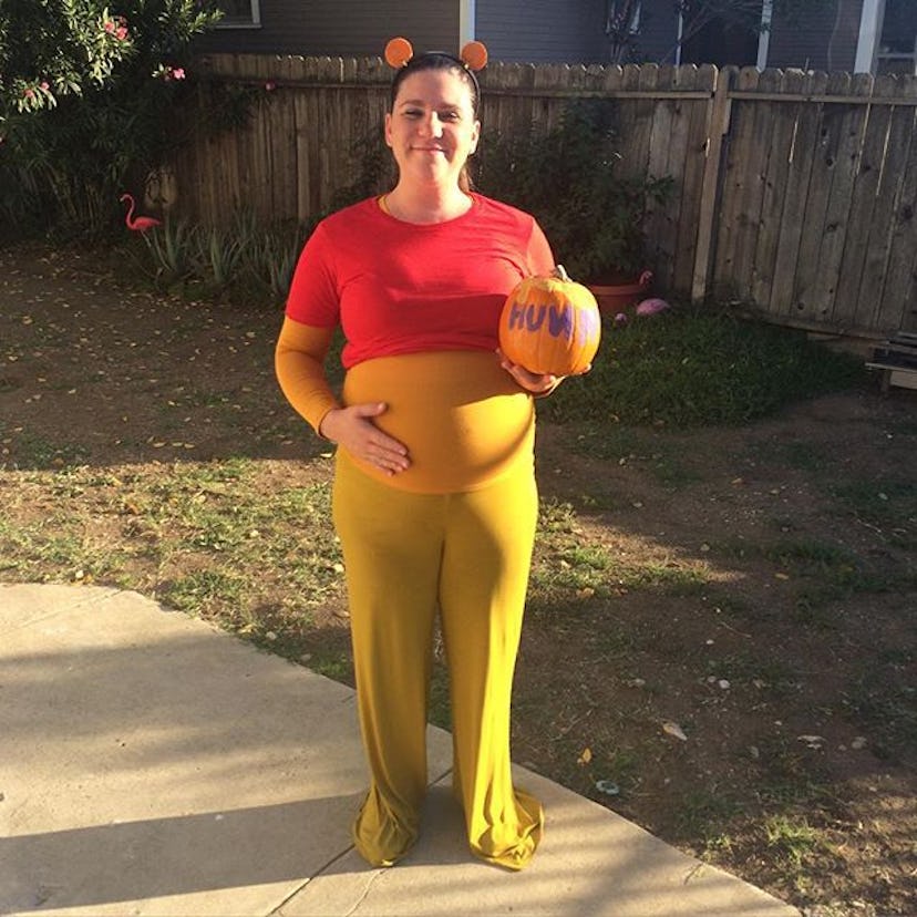 A pregnant woman in Winnie The Pooh Halloween Costume