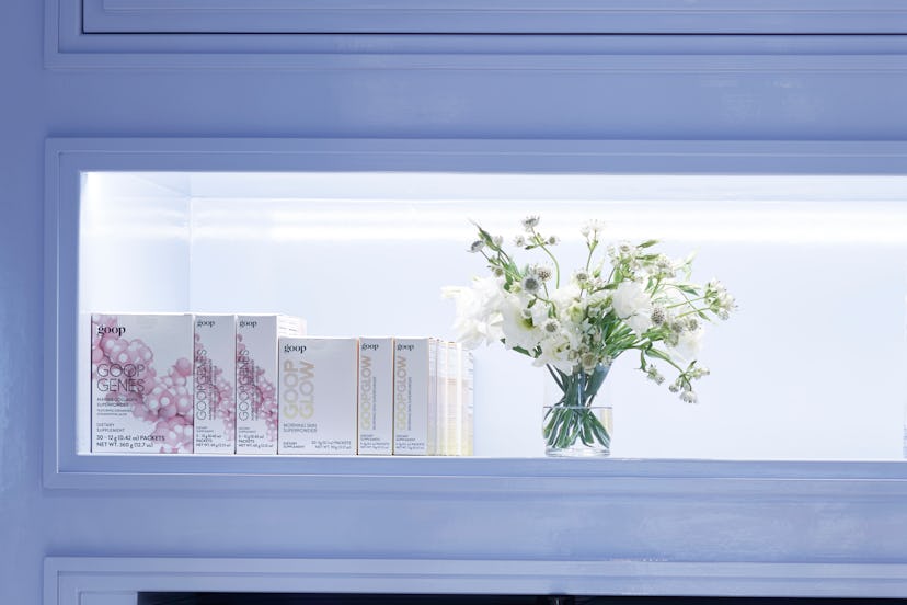 Goop's newest store, with a small window that houses goop products as well as a vase with white flow...