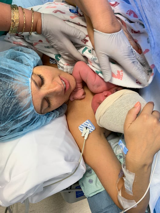 A mom holds her newly born son after having a C-section. 
