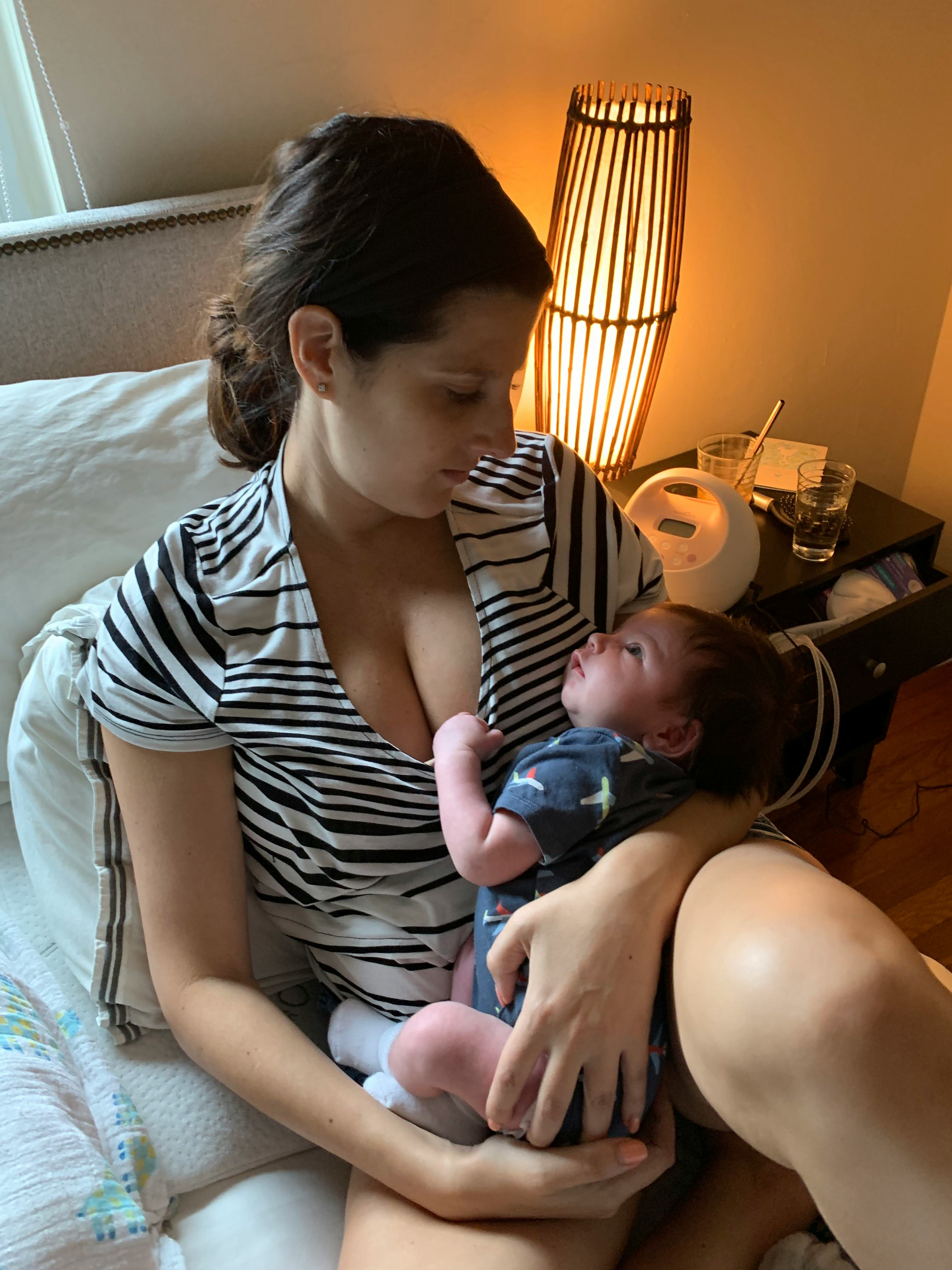 A picture of the author, Dara Smith, holding her infant son.