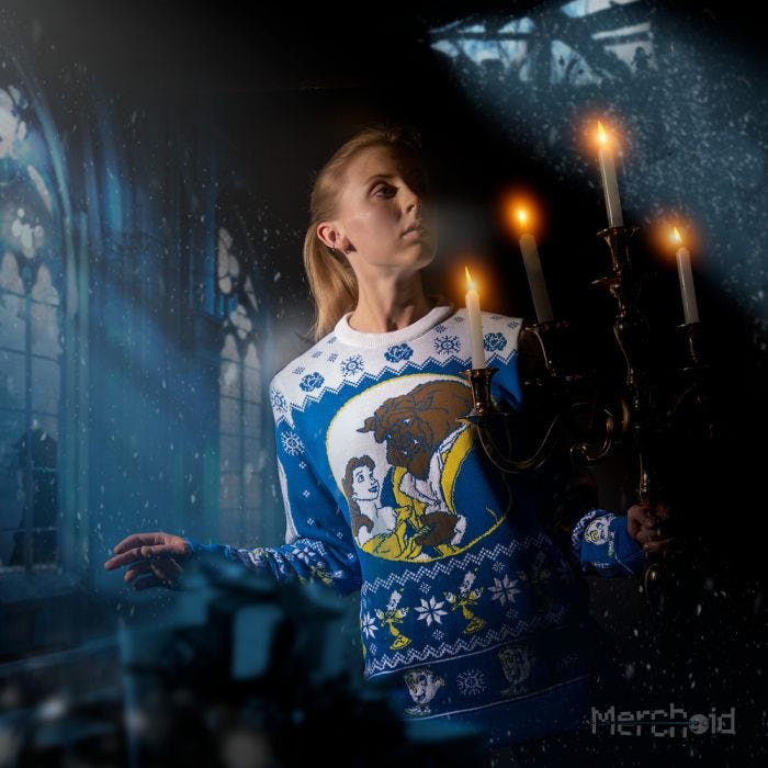 woman in a Disney ugly Christmas sweater 
