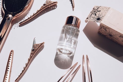 Perfume, brush, and clips from Kristin Ess' holiday sets