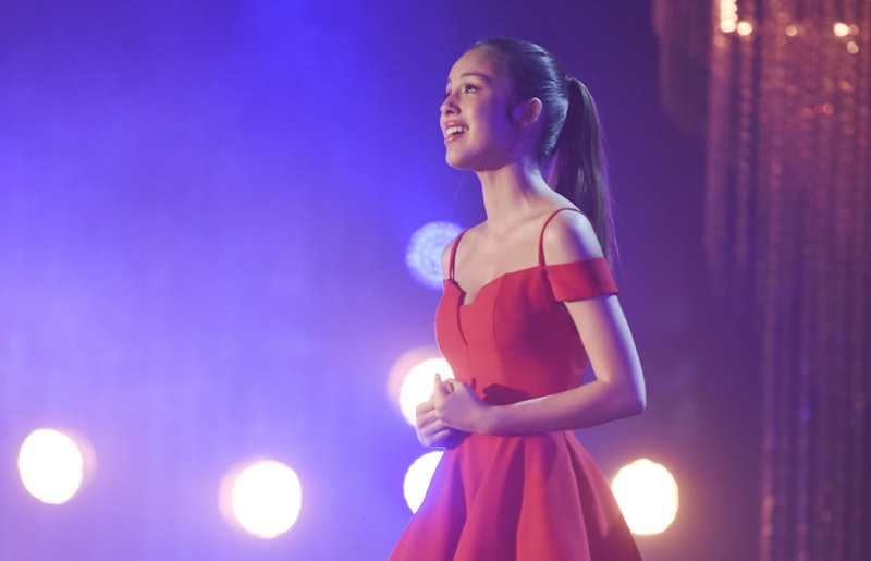 Nini singing as Gabriella Montez in High School Musical: The Musical: The Series