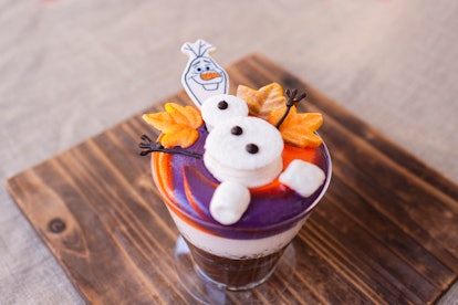 The Olaf’s Frozen Hot Chocolate Cake — which has marshmallows on top to look like a snowman — is ava...