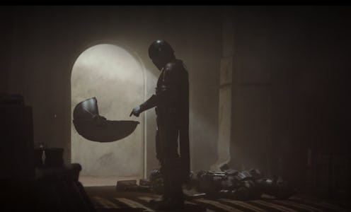 The Mandalorian with Baby Yoda in Disney+'s The Mandalorian.