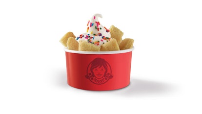 Wendy's Birthday Cake Frosty Cookie Sundae comes topped with sprinkles and sugar cookie pieces.