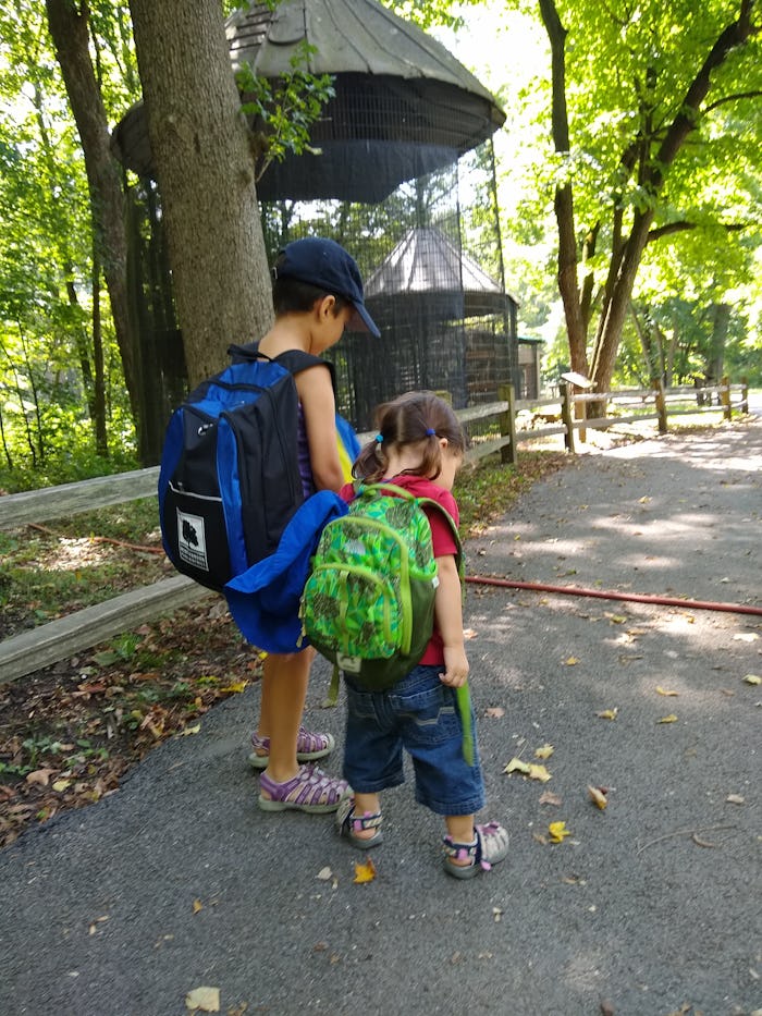 Rae's two children, on a typical day of homeschooling, visiting the local nature center