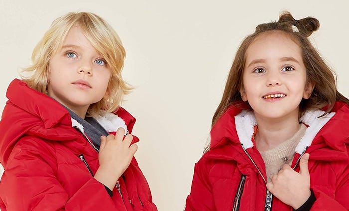 a boy and a girl wearing red orolay hooded down jackets