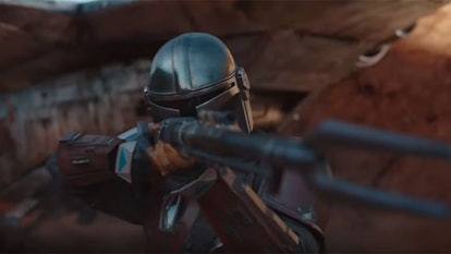 The Mandalorian and his rifle in the new Disney+ Star Wars series. 
