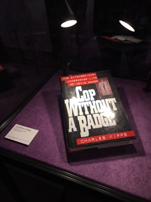 'Cop Without a Badge' book in display case at BravoCon 2019