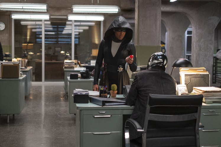 Sister Night and Looking Glass in Watchmen