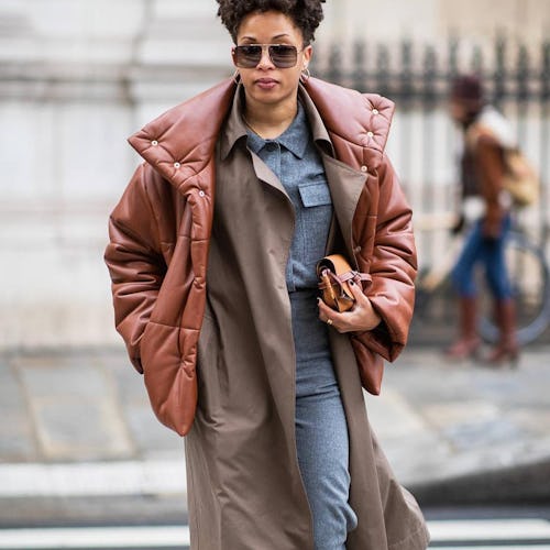 Street style photo of influencer at fashion week dressed in a layered winter outfit featuring Nanush...