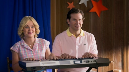 Amy Poehler and Bradley Cooper reprise their roles from Wet Hot American Summer.