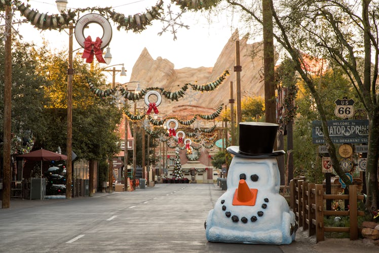 The entrance to Cars Land at Disneyland is transformed for the holidays with Christmas decorations.