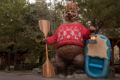 The Grizzly Peak Bear at Disney's California Adventure gets a holiday makeover with a Christmas swea...