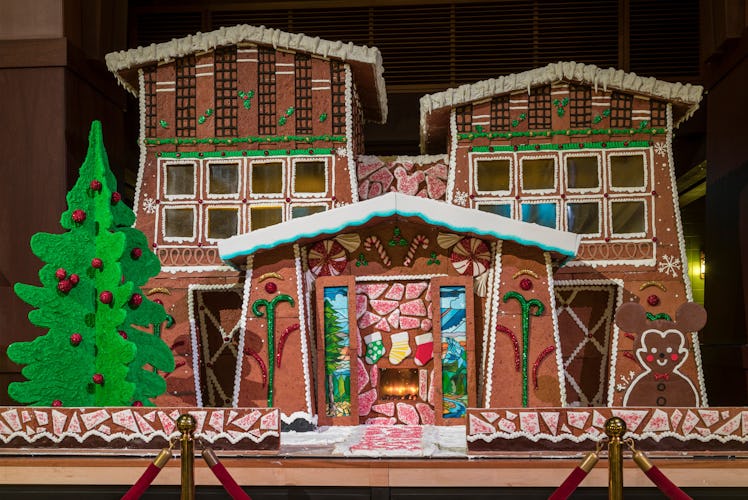 The giant gingerbread house sits in the Disney's Grand Californian Hotel lobby during the holidays. 