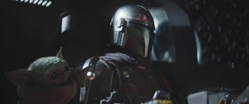 Baby Yoda and Pedro Pascal in The Mandalorian
