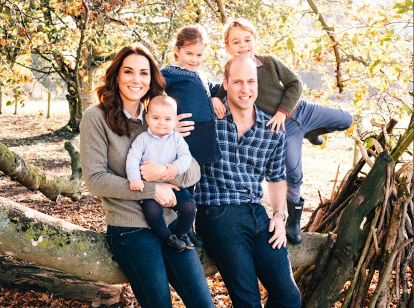 Prince George & Princess Charlotte pose with their parents and baby brother Prince Louis for the 201...