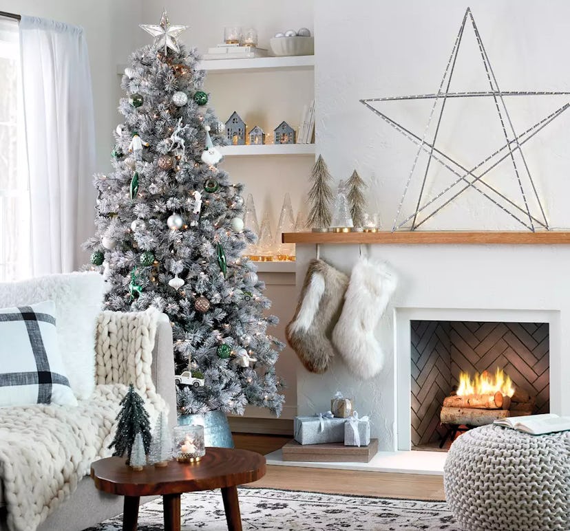 Target Christmas Decor Weekend Deal; neutral living room decorated with grey, silver, gold, and whit...