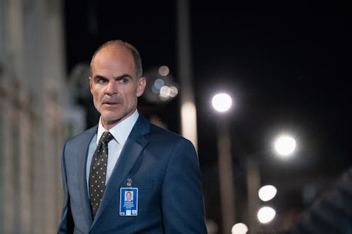 Mike November in a suit on Jack Ryan