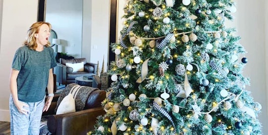 A husband surprised his wife with a giant Christmas tree.