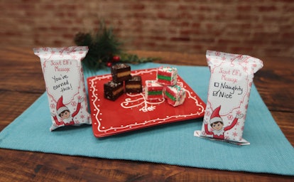 Elf On The Shelf Cake Bites with handwritten notes on the packaging