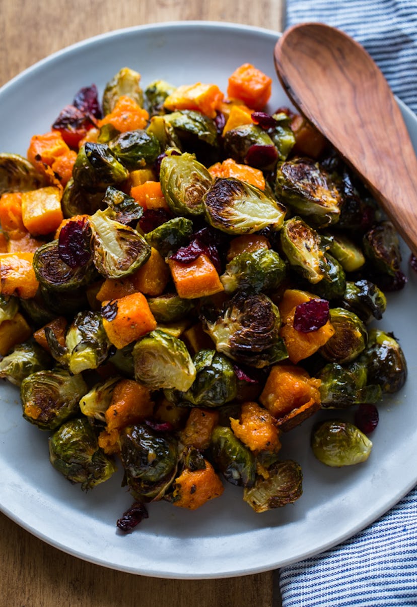 sheet pan thanksgiving sides, roasted brussels sprouts squash dried cranberries dijon vinaigrette