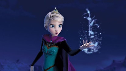 Elsa from Disney's Frozen holds a magical snowflake in her hand.