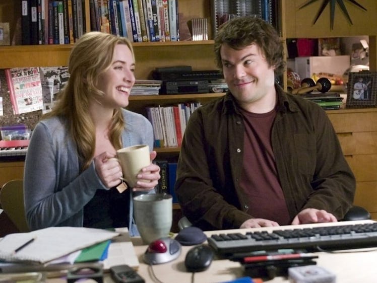 Kate Winlset and Jack Black laugh during a scene from The Holiday. 