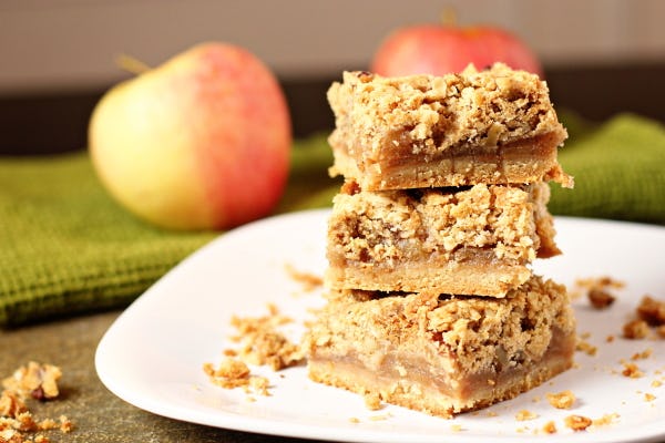 Thanksgiving sheet pan dessert, apple pie bar, on a white plate