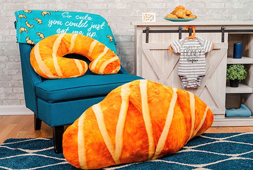 Cheddar's bundle for new parents includes a four foot long croissant body pillow. 