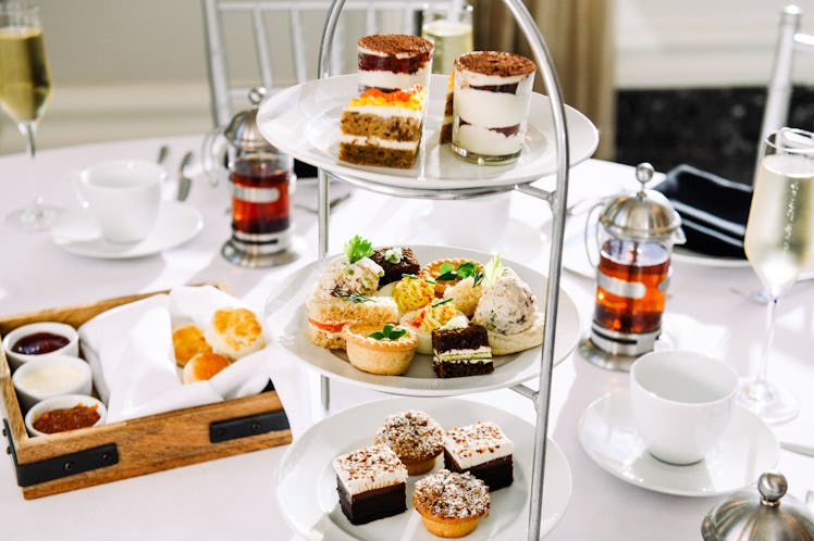 The spread at Waldorf Astoria Atlanta Buckhead's afternoon tea includes sweet pastries, breads, and ...