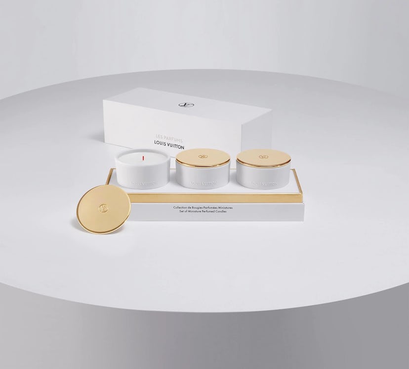 Louis Vuitton's set of miniature perfumed candles includes three different scents to elevate your ho...