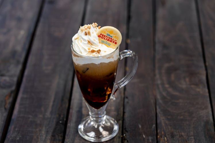 The churro toffee cold brew drink with whipped cream is offered at Disneyland's holiday celebration....