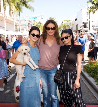 Kendall, Kylie, and Caitlyn Jenner strike a post.