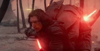 Adam Driver as Kylo Ren with a yellow blaster bolt behind his head in Star Wars: The Rise of Skywalk...