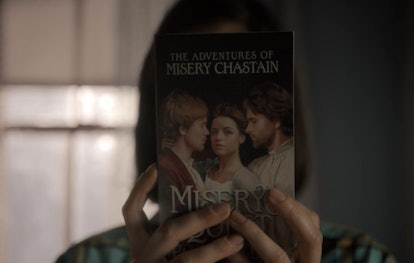 Annie holding Paul Sheldon's 'Misery' book in Castle Rock Season 2