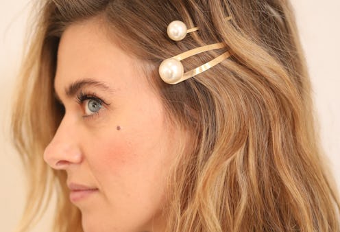 Secure the side of your hair with R+Co's new pearl hair pins for a festive look