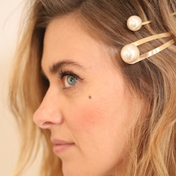 Secure the side of your hair with R+Co's new pearl hair pins for a festive look