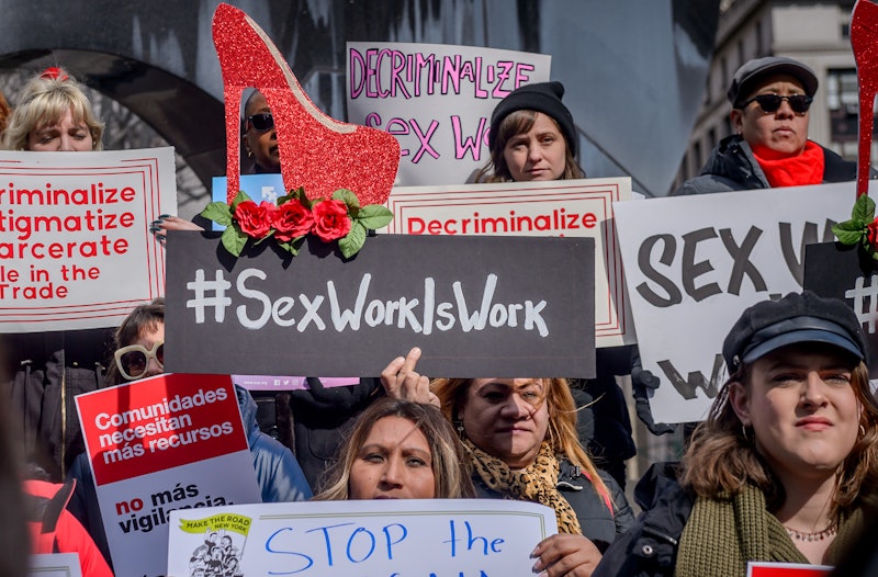 Protestors call for full decriminalization of sex work.