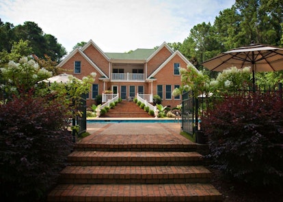 A brick mansion near Mistletoe State Park, Georgia is made for a luxe vacation during the holidays.