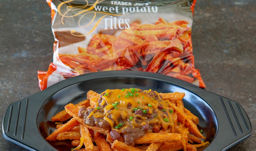 Add cheese to your favorite Trader Joe's frozen dinner for a quick meal hack.