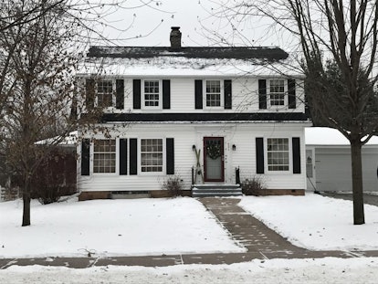 A white house surrounded by snow in Rudolph, Wisconsin is the perfect place to rent for a holiday-th...