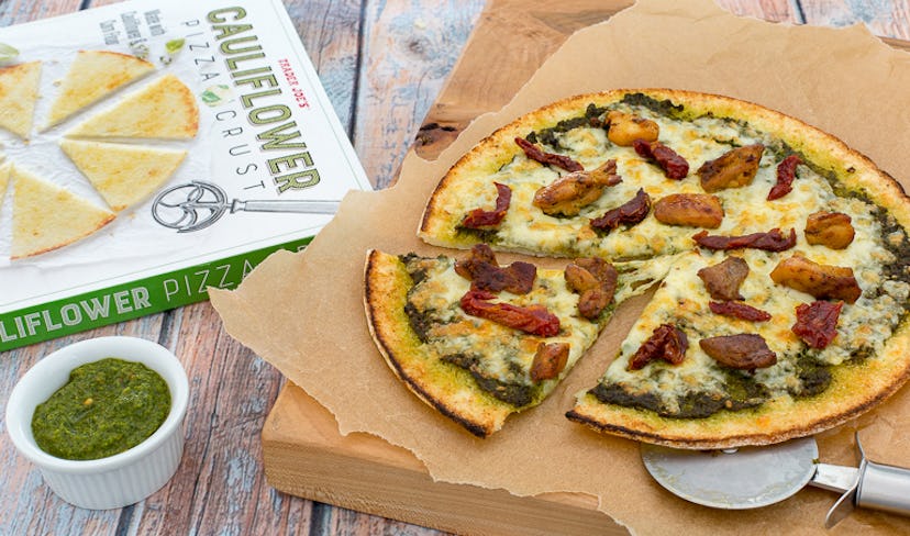 Put your favorite Trader Joe's frozen meals atop a pizza for a simple, elevated meal.