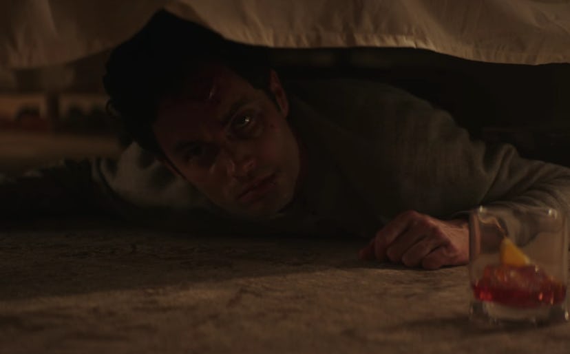 Joe (Penn Badgley) hides underneath the bed in 'YOU' Season 1