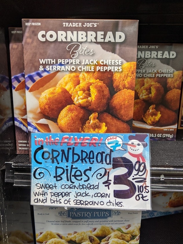 Trader Joe's display of packed, pre-made, frozen cornbread bites with pepperjack, corn, and serrano ...