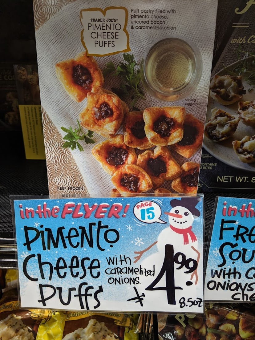 Trader Joe's display of packed, pre-made, frozen Pimento Cheese Puffs